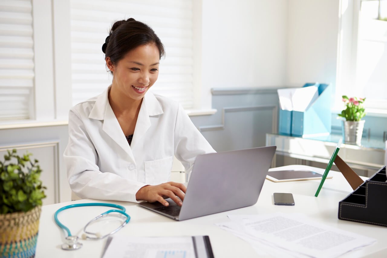Doctor reviewing care information